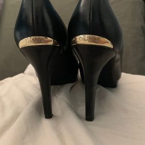 Calvin Klein black leather heels 7